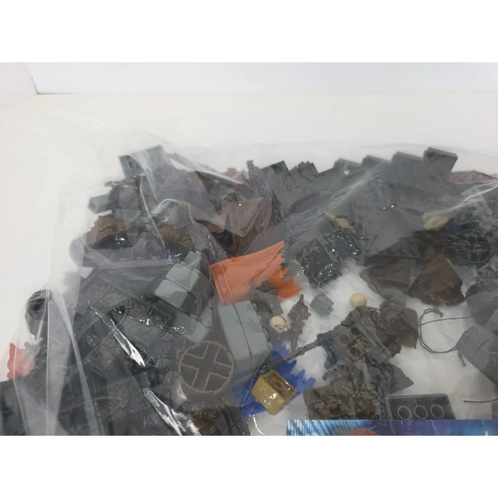 Large Mega Bloks lot Dragons Man o War pieces + challenge game pieces manuals